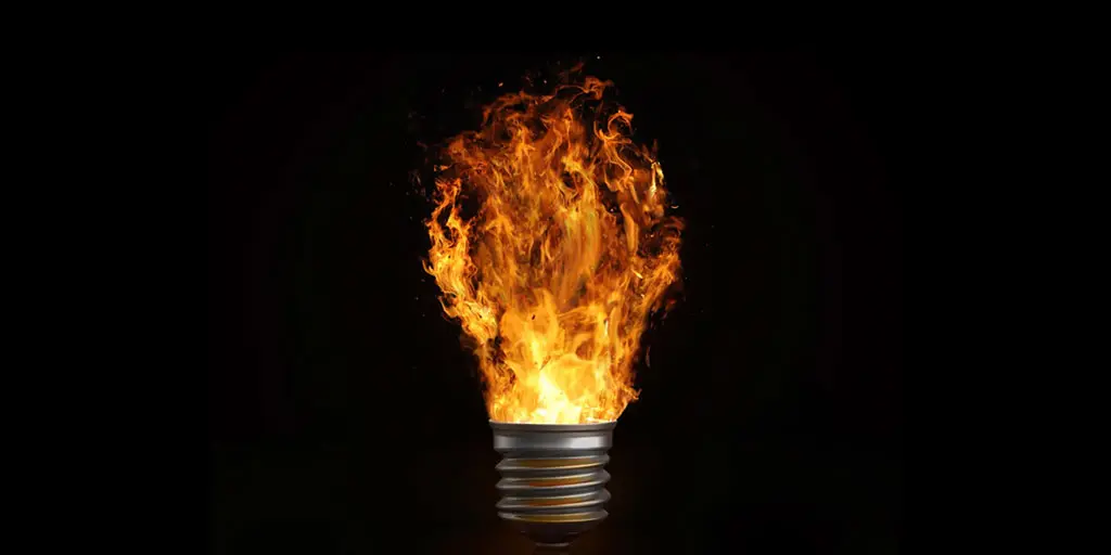 Incandescent bulb on fire