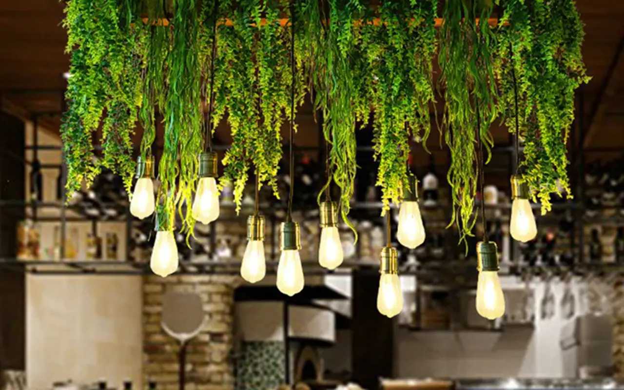 10. Hanging Bulbs with Greenery